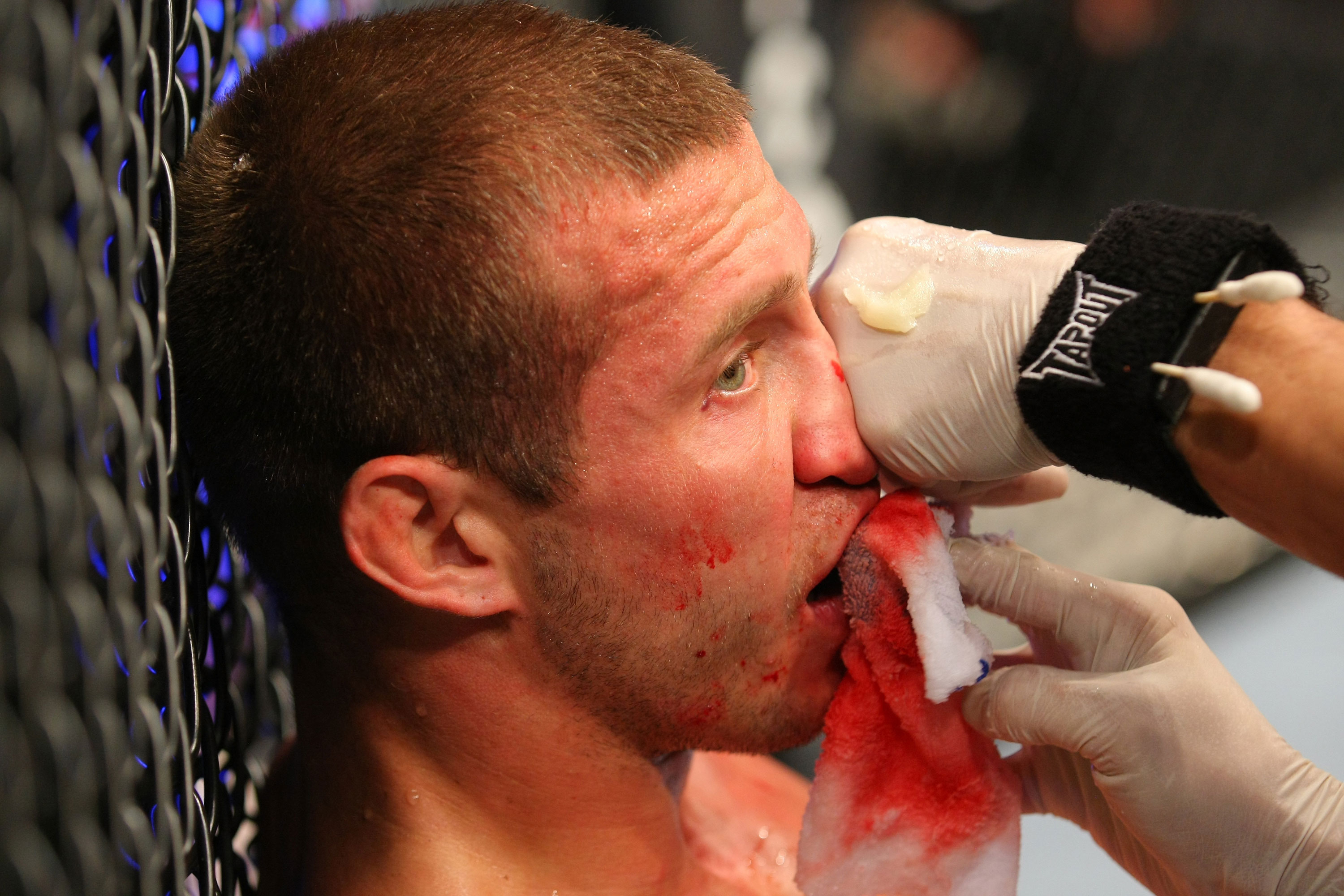 LAS VEGAS, NV - DECEMBER 30: Donald Cerrone is inspected by cutmen inbetween rounds during the UFC 141 event at the MGM Grand Garden Arena on December 30, 2011 in Las Vegas, Nevada. (Photo by Donald Miralle/Zuffa LLC/Zuffa LLC via Getty Images) *** Local Caption *** Donald Cerrone
