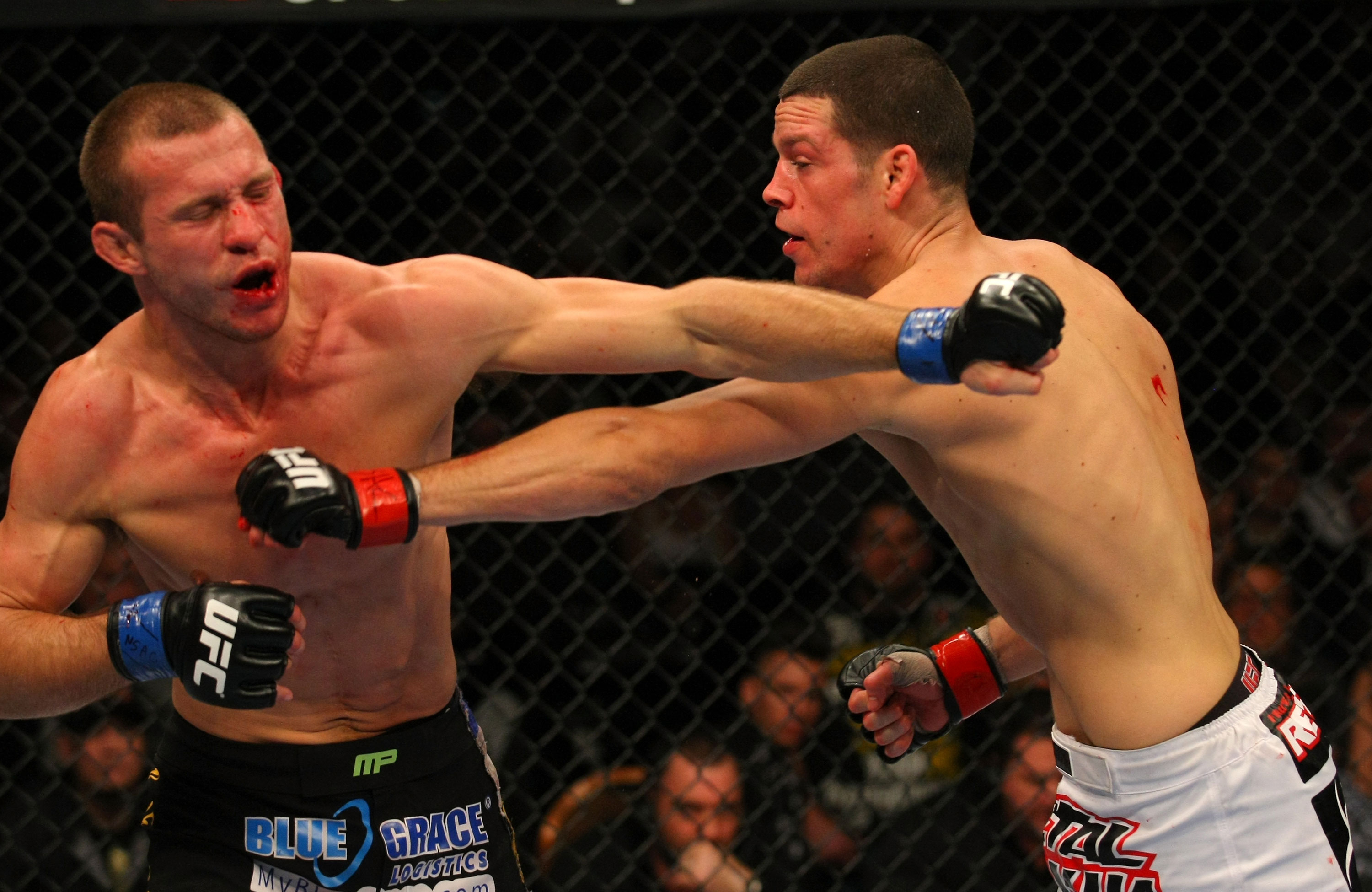 LAS VEGAS, NV - DECEMBER 30: Donald Cerrone (left) and Nate Diaz (right) exchange blows during the UFC 141 event at the MGM Grand Garden Arena on December 30, 2011 in Las Vegas, Nevada. (Photo by Donald Miralle/Zuffa LLC/Zuffa LLC via Getty Images) *** Local Caption *** Donald Cerrone; Nate Diaz