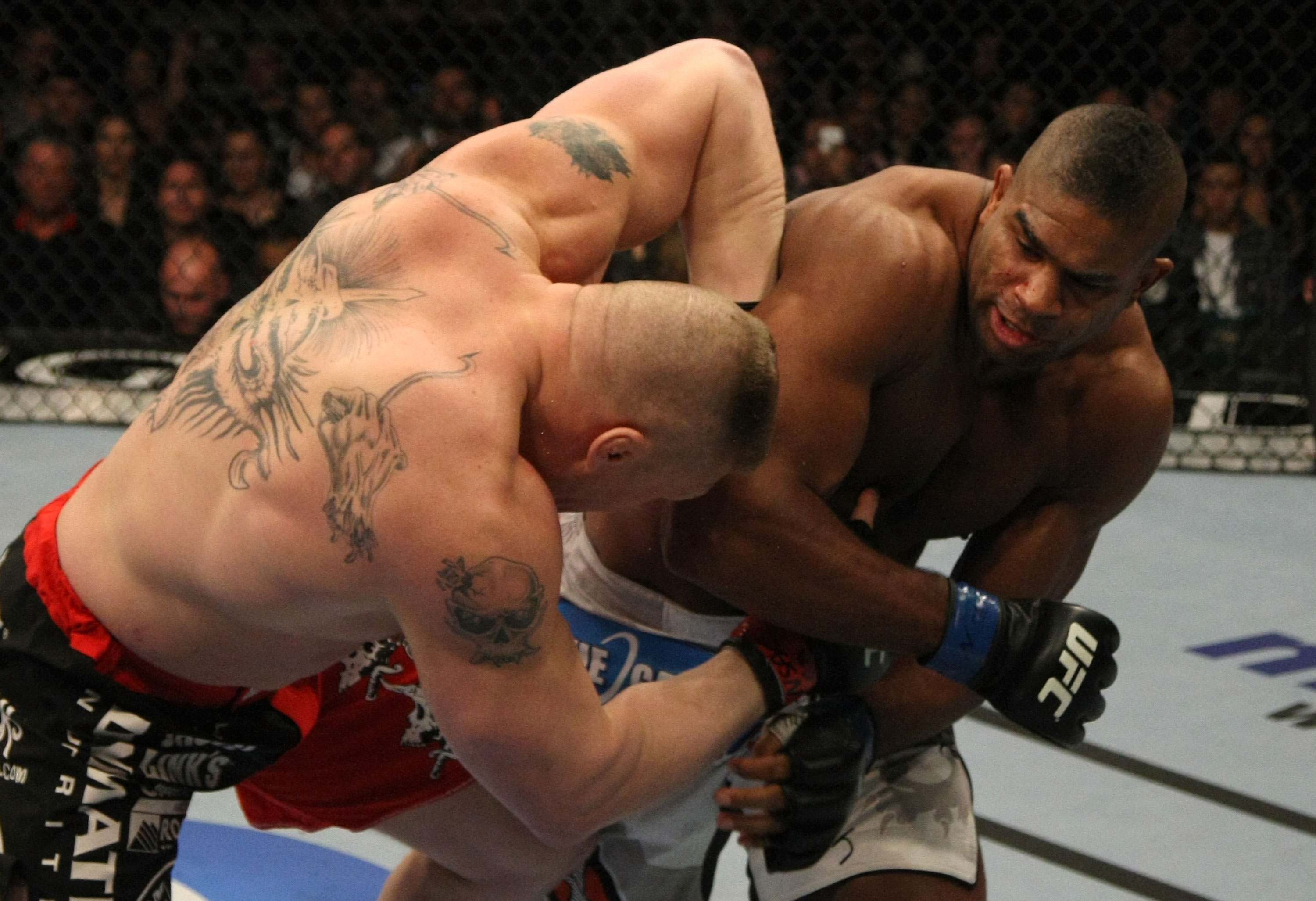 LAS VEGAS, NV - DECEMBER 30: Alistair Overeem (right) punches Brock Lesnar (left) during the UFC 141 event at the MGM Grand Garden Arena on December 30, 2011 in Las Vegas, Nevada. (Photo by Donald Miralle/Zuffa LLC/Zuffa LLC via Getty Images) *** Local Caption *** Alistair Overeem; Brock Lesnar