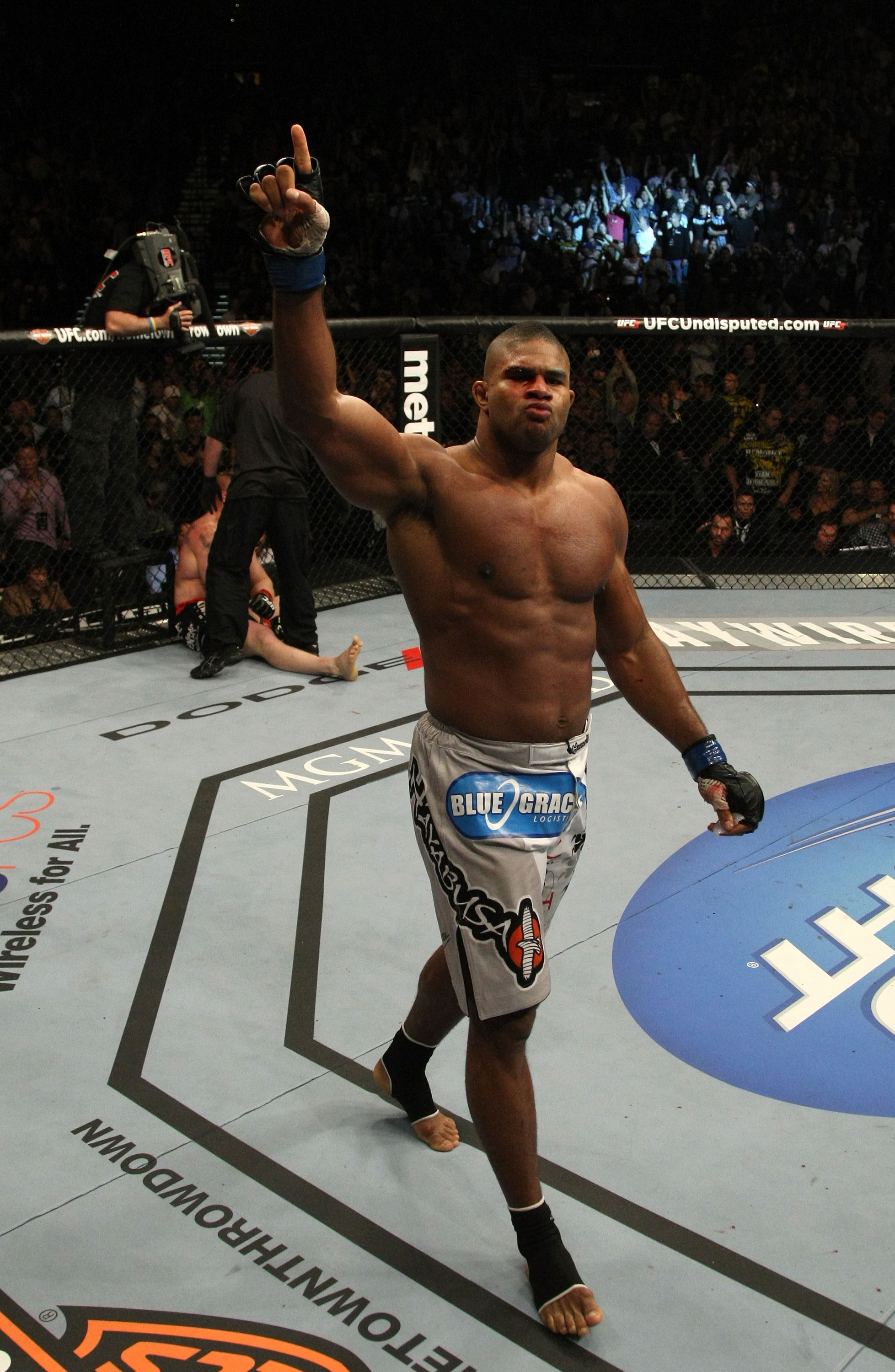 LAS VEGAS, NV - DECEMBER 30: Alistair Overeem celebrates his win over Brock Lesnar during the UFC 141 event at the MGM Grand Garden Arena on December 30, 2011 in Las Vegas, Nevada. (Photo by Donald Miralle/Zuffa LLC/Zuffa LLC via Getty Images) *** Local Caption *** Alistair Overeem
