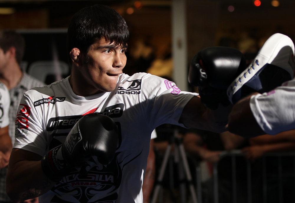SUNRISE, FL - JUNE 06:   Erick Silva works out for fans and media during the UFC open workouts at Sawgrass Mills Mall on June 6, 2012 in Sunrise, Florida.  (Photo by Josh Hedges/Zuffa LLC/Zuffa LLC via Getty Images)