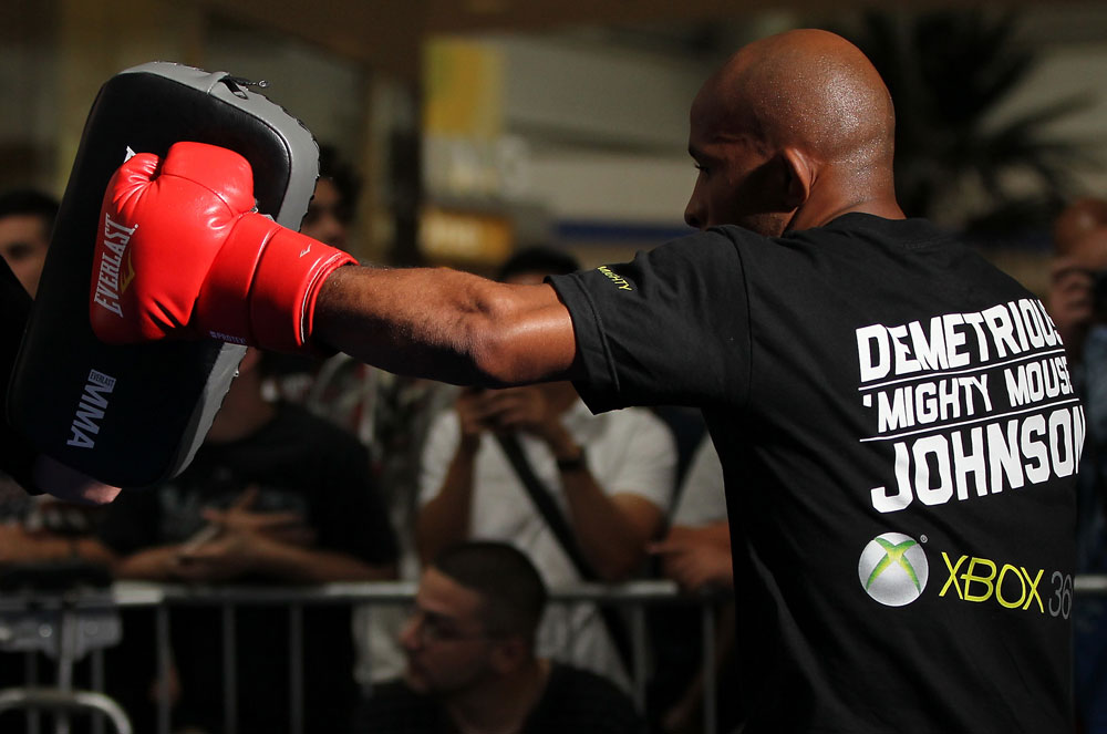 SUNRISE, FL - JUNE 06:   Demetrious Johnson works out for fans and media during the UFC open workouts at Sawgrass Mills Mall on June 6, 2012 in Sunrise, Florida.  (Photo by Josh Hedges/Zuffa LLC/Zuffa LLC via Getty Images)