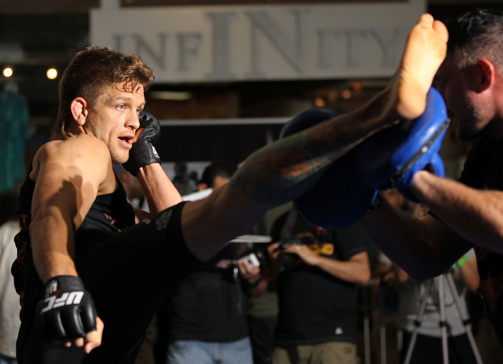 SUNRISE, FL - JUNE 06:   Mike Pyle works out for the fans and media during the UFC open workouts at Sawgrass Mills Mall on June 6, 2012 in Sunrise, Florida.  (Photo by Josh Hedges/Zuffa LLC/Zuffa LLC via Getty Images)