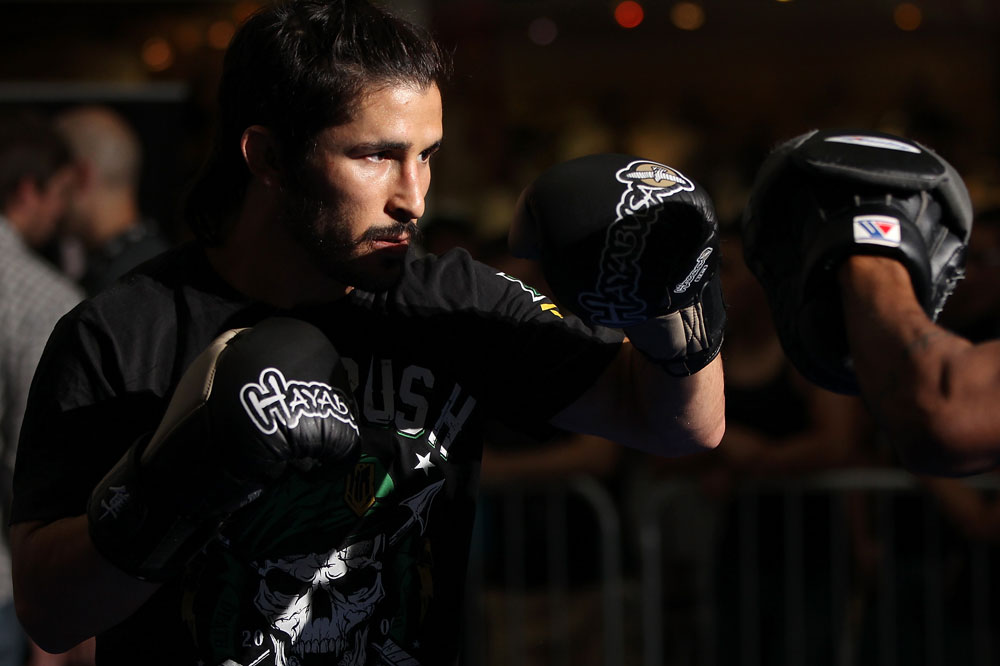 SUNRISE, FL - JUNE 06:   Ian McCall works out for fans and media during the UFC open workouts at Sawgrass Mills Mall on June 6, 2012 in Sunrise, Florida.  (Photo by Josh Hedges/Zuffa LLC/Zuffa LLC via Getty Images)