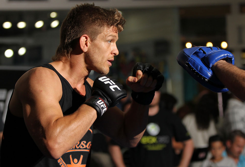 SUNRISE, FL - JUNE 06:   Mike Pyle works out for the fans and media during the UFC open workouts at Sawgrass Mills Mall on June 6, 2012 in Sunrise, Florida.  (Photo by Josh Hedges/Zuffa LLC/Zuffa LLC via Getty Images)
