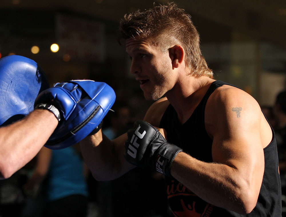 SUNRISE, FL - JUNE 06:   Mike Pyle works out for the fans and media during the UFC open workouts at Sawgrass Mills Mall on June 6, 2012 in Sunrise, Florida.  (Photo by Josh Hedges/Zuffa LLC/Zuffa LLC via Getty Images)