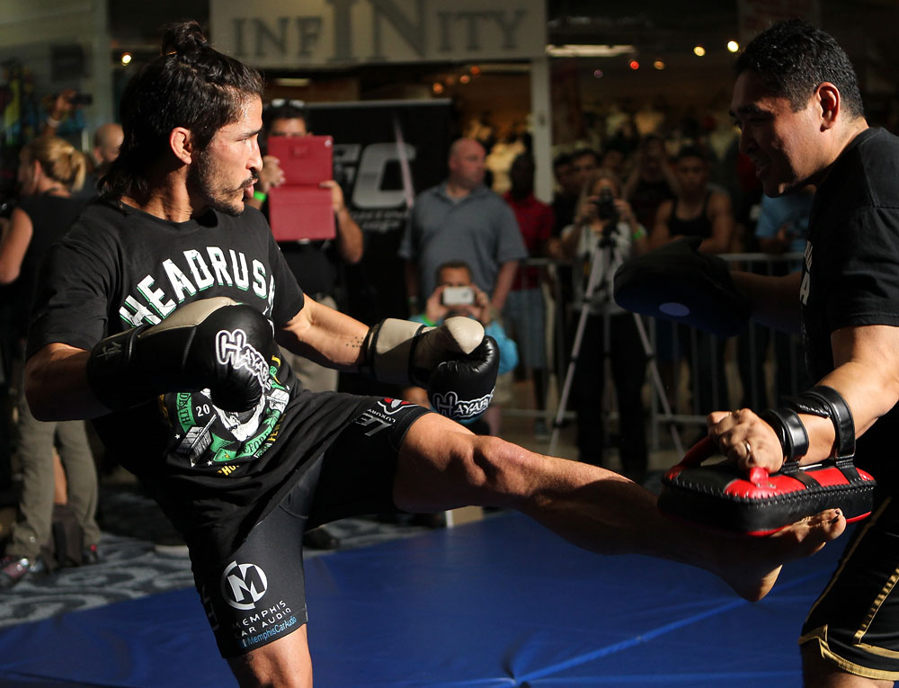 SUNRISE, FL - JUNE 06:   Ian McCall works out for fans and media during the UFC open workouts at Sawgrass Mills Mall on June 6, 2012 in Sunrise, Florida.  (Photo by Josh Hedges/Zuffa LLC/Zuffa LLC via Getty Images)