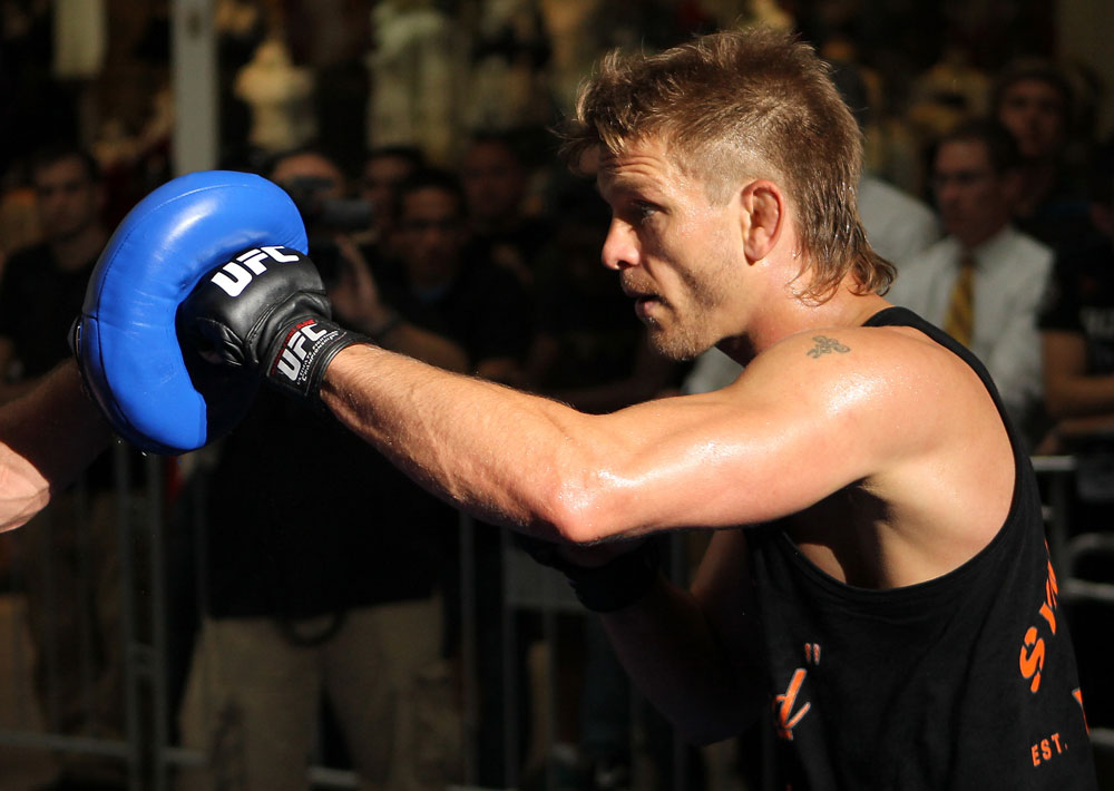 SUNRISE, FL - JUNE 06:   Mike Pyle works out for the fans and media during the UFC open workouts at Sawgrass Mills Mall on June 6, 2012 in Sunrise, Florida.  (Photo by Josh Hedges/Zuffa LLC/Zuffa LLC via Getty Images)