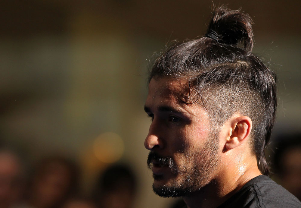 SUNRISE, FL - JUNE 06:   Ian McCall works out for fans and media during the UFC open workouts at Sawgrass Mills Mall on June 6, 2012 in Sunrise, Florida.  (Photo by Josh Hedges/Zuffa LLC/Zuffa LLC via Getty Images)