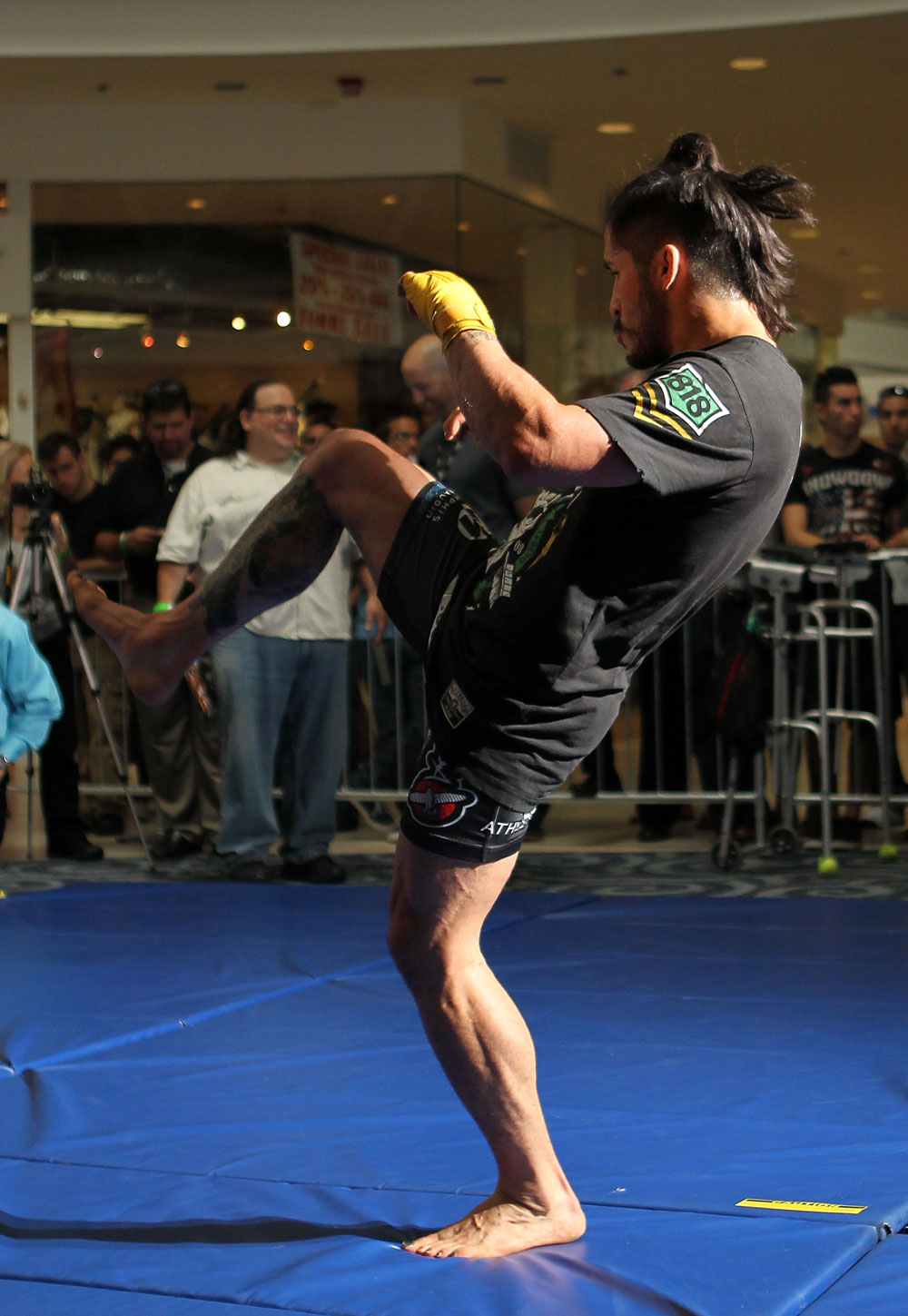 SUNRISE, FL - JUNE 06:   Ian McCall works out for fans and media during the UFC open workouts at Sawgrass Mills Mall on June 6, 2012 in Sunrise, Florida.  (Photo by Josh Hedges/Zuffa LLC/Zuffa LLC via Getty Images)