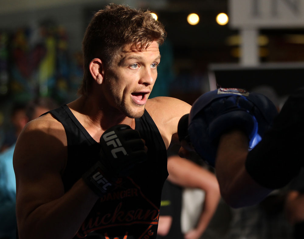 SUNRISE, FL - JUNE 06:   Mike Pyle works out for the fans and media during the UFC open workouts at Sawgrass Mills Mall on June 6, 2012 in Sunrise, Florida.  (Photo by Josh Hedges/Zuffa LLC/Zuffa LLC via Getty Images)