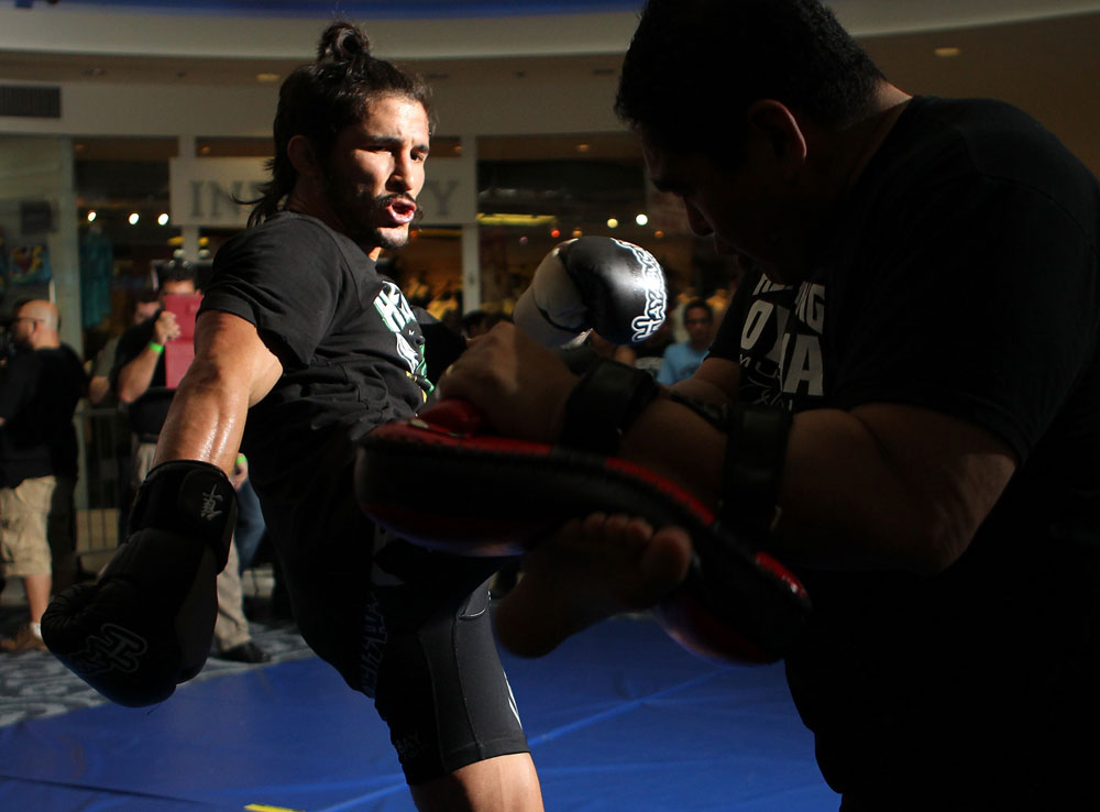 SUNRISE, FL - JUNE 06:   Ian McCall works out for fans and media during the UFC open workouts at Sawgrass Mills Mall on June 6, 2012 in Sunrise, Florida.  (Photo by Josh Hedges/Zuffa LLC/Zuffa LLC via Getty Images)