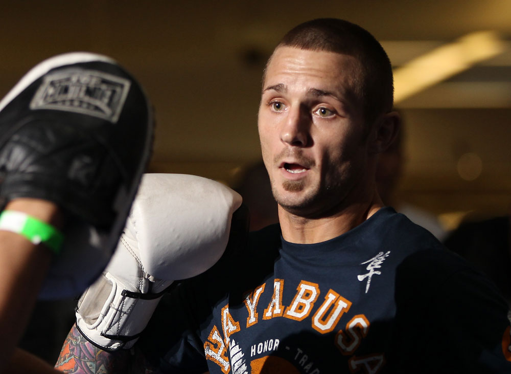 SUNRISE, FL - JUNE 06:   Eddie Wineland works out for fans and media during the UFC open workouts at Sawgrass Mills Mall on June 6, 2012 in Sunrise, Florida.  (Photo by Josh Hedges/Zuffa LLC/Zuffa LLC via Getty Images)