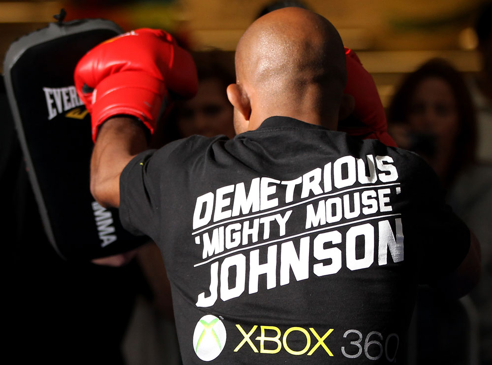 SUNRISE, FL - JUNE 06:   Demetrious Johnson works out for fans and media during the UFC open workouts at Sawgrass Mills Mall on June 6, 2012 in Sunrise, Florida.  (Photo by Josh Hedges/Zuffa LLC/Zuffa LLC via Getty Images)