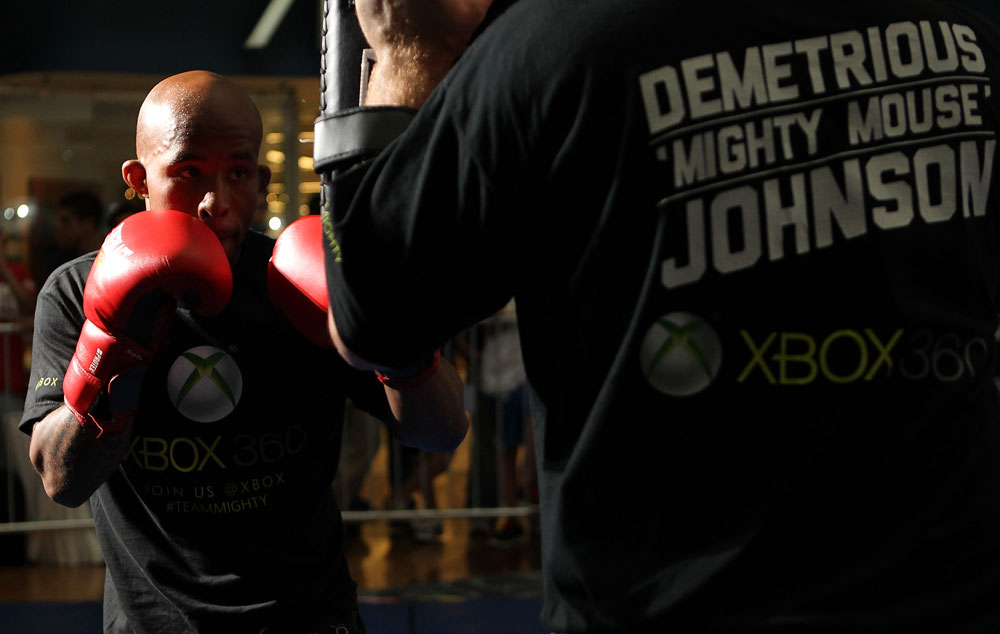 SUNRISE, FL - JUNE 06:   Demetrious Johnson works out for fans and media during the UFC open workouts at Sawgrass Mills Mall on June 6, 2012 in Sunrise, Florida.  (Photo by Josh Hedges/Zuffa LLC/Zuffa LLC via Getty Images)