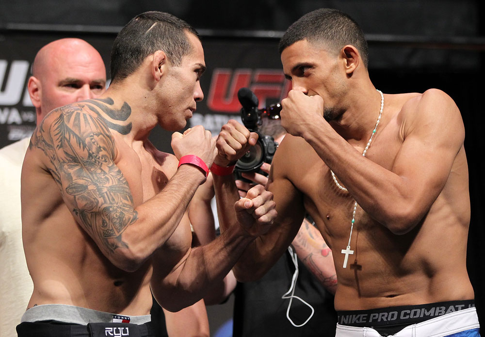 LAS VEGAS, NV - JULY 6: (L-R) Opponents Rafaello Oliveira and Yoislandy Izquierdo face off during the UFC 148 Weigh In at the Mandalay Bay Events Center on July 6, 2012 in Las Vegas, Nevada. (Photo by Josh Hedges/Zuffa LLC/Zuffa LLC via Getty Images)