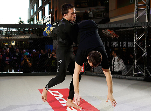 MONTREAL, QC - MARCH 13: Jake Ellenberger (L) conducts an open training session for fans and media ahead of his UFC 158 bout at Complexe Desjardins on March 13, 2013 in Montreal, Quebec, Canada. (Photo by Josh Hedges/Zuffa LLC/Zuffa LLC via Getty Images)