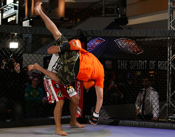 MONTREAL, QC - MARCH 13: Johny Hendricks (L) conducts an open training session for fans and media ahead of his UFC 158 bout at Complexe Desjardins on March 13, 2013 in Montreal, Quebec, Canada. (Photo by Josh Hedges/Zuffa LLC/Zuffa LLC via Getty Images)