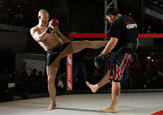 MONTREAL, QC - MARCH 13: Nate Marquardt (L) conducts an open training session for fans and media ahead of his UFC 158 bout at Complexe Desjardins on March 13, 2013 in Montreal, Quebec, Canada. (Photo by Josh Hedges/Zuffa LLC/Zuffa LLC via Getty Images)