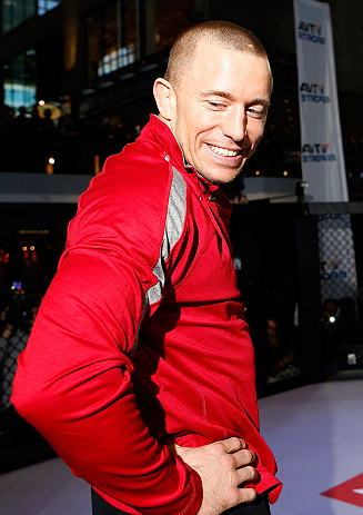MONTREAL, QC - MARCH 13: UFC welterweight champion Georges St-Pierre stands in the Octagon during the UFC 158 open workouts at Complexe Desjardins on March 13, 2013 in Montreal, Quebec, Canada. (Photo by Josh Hedges/Zuffa LLC/Zuffa LLC via Getty Images)
