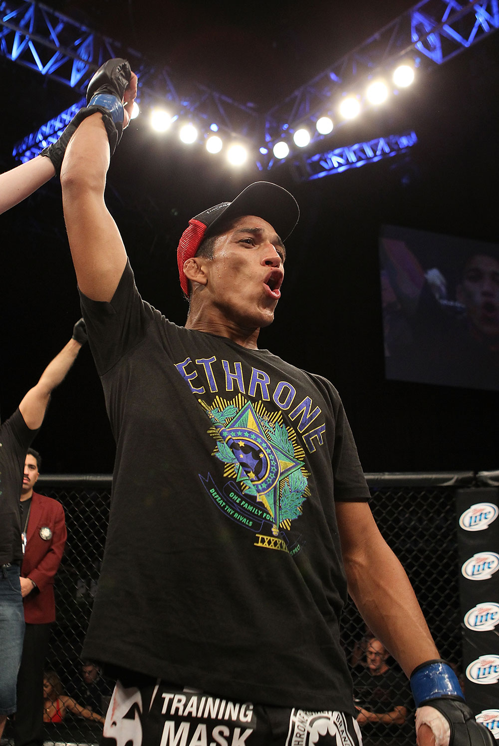 LAS VEGAS, NV - JUNE 01: Charles Oliveira reacts to being declared the winner in a Featherweight bout against Jonathan Brookins during The Ultimate Fighter Live Finale at the Pearl Theater at the Palms Casino Resort on June 1, 2012 in Las Vegas, Nevada. (Photo by Josh Hedges/Zuffa LLC/Zuffa LLC via Getty Images) *** Local Caption *** Charles Oliveira