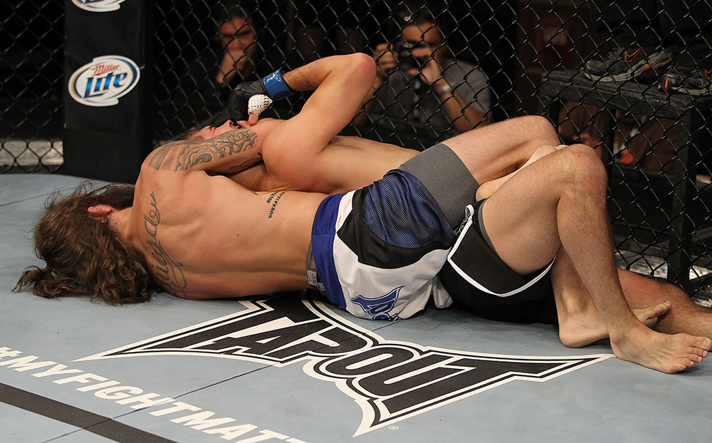 LAS VEGAS, NV - JUNE 01: (L-R) Michael Chiesa attempts to submit Al Iaquinta in a Lightweight bout during The Ultimate Fighter Live Finale at the Pearl Theater at the Palms Casino Resort on June 1, 2012 in Las Vegas, Nevada. (Photo by Josh Hedges/Zuffa LLC/Zuffa LLC via Getty Images) *** Local Caption *** Al Iaquinta; Michael Chiesa