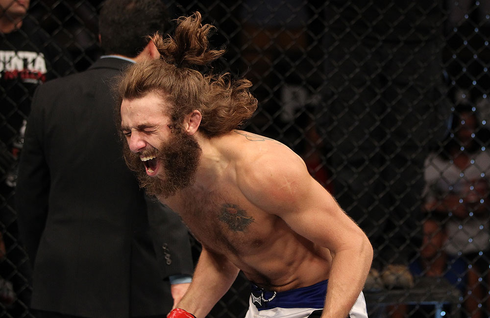 LAS VEGAS, NV - JUNE 01: Michael Chiesa reacts to his submission victory in a Lightweight bout against Al Iaquinta during The Ultimate Fighter Live Finale at the Pearl Theater at the Palms Casino Resort on June 1, 2012 in Las Vegas, Nevada. (Photo by Josh Hedges/Zuffa LLC/Zuffa LLC via Getty Images) *** Local Caption *** Michael Chiesa