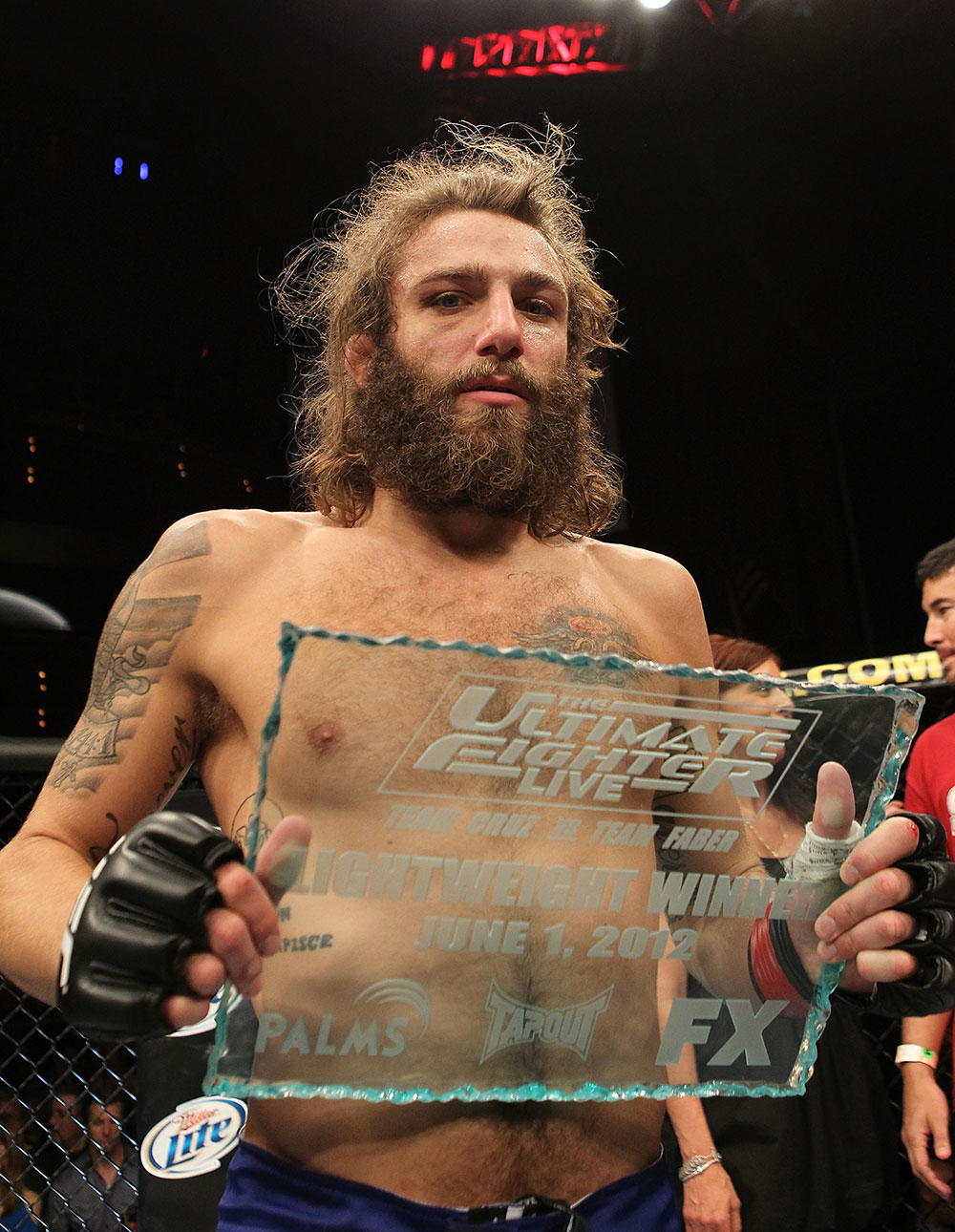 LAS VEGAS, NV - JUNE 01: Michael Chiesa holding the Ultimate Fighter trophy during The Ultimate Fighter Live Finale at the Pearl Theater at the Palms Casino Resort on June 1, 2012 in Las Vegas, Nevada. (Photo by Josh Hedges/Zuffa LLC/Zuffa LLC via Getty Images) *** Local Caption *** Michael Chiesa