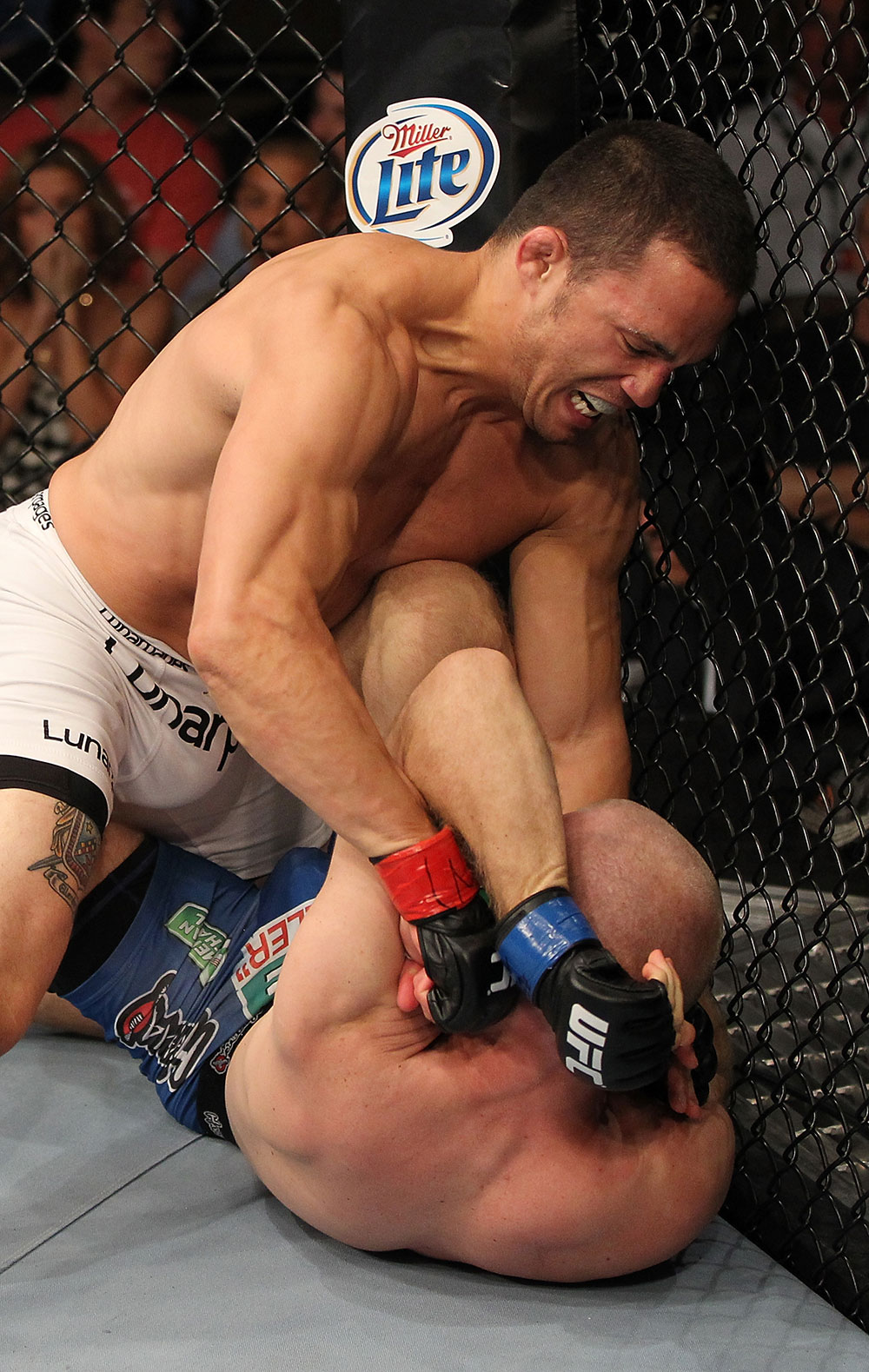 LAS VEGAS, NV - JUNE 01: Jake Ellenberger (top) punches Martin Kampmann in a Welterweight bout during The Ultimate Fighter Live Finale at the Pearl Theater at the Palms Casino Resort on June 1, 2012 in Las Vegas, Nevada. (Photo by Josh Hedges/Zuffa LLC/Zuffa LLC via Getty Images) *** Local Caption *** Jake Ellenberger; Martin Kampmann
