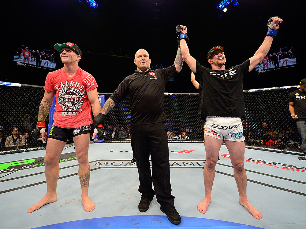 LAS VEGAS, NV - JULY 7:   Shane Roller (right) reacts to being declared the winner over John Alessio during their lightweight bout at UFC 148 inside MGM Grand Garden Arena on July 7, 2012 in Las Vegas, Nevada.  (Photo by Donald Miralle/Zuffa LLC/Zuffa LLC via Getty Images)  *** Local Caption *** John Alessio; Shane Roller
