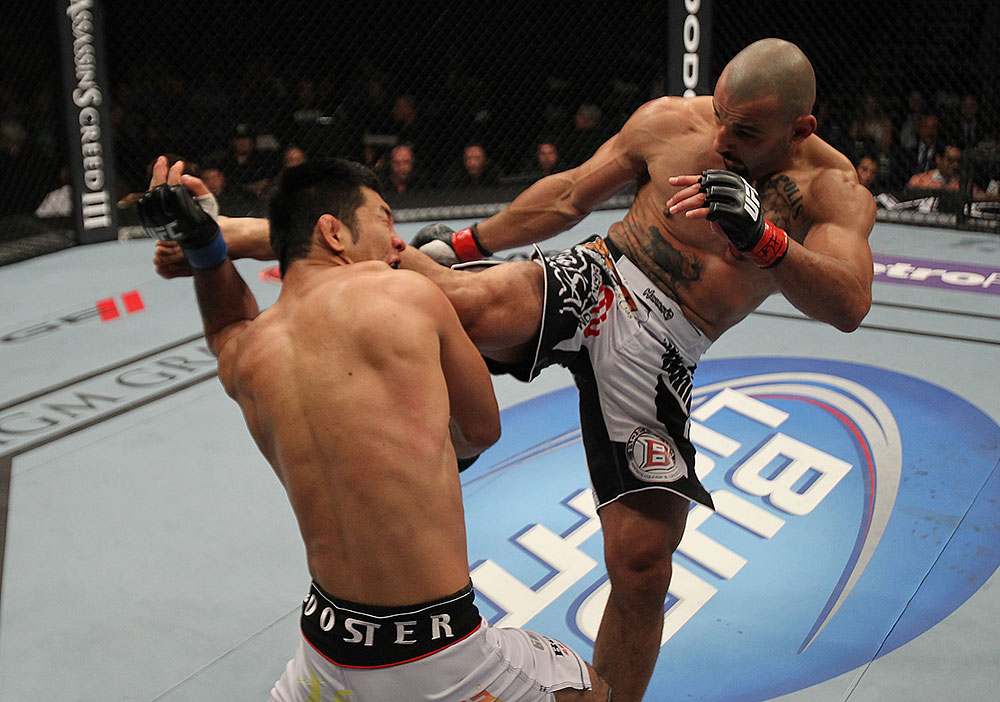 LAS VEGAS, NV - JULY 7:   (R-L) Costa Philippou kicks Riki Fukuda during their middleweight bout at UFC 148 inside MGM Grand Garden Arena on July 7, 2012 in Las Vegas, Nevada.  (Photo by Josh Hedges/Zuffa LLC/Zuffa LLC via Getty Images)  *** Local Caption *** Constantinos Philippou; Riki Fukuda