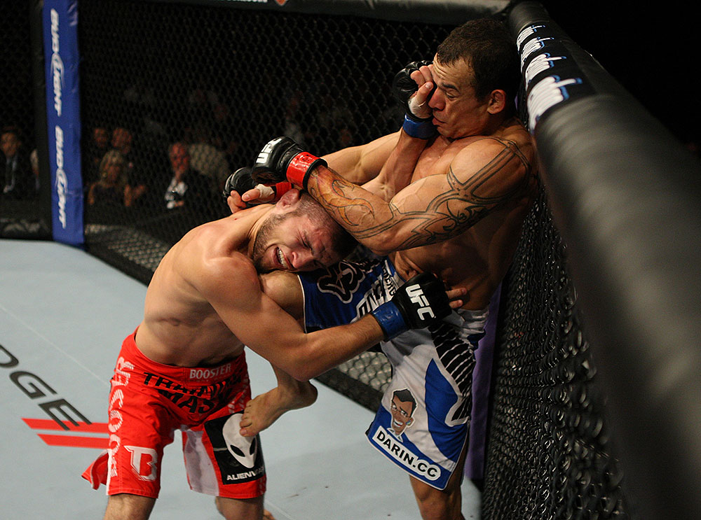 LAS VEGAS, NV - JULY 7:   (R-L) Gleison Tibau knees Khabib Nurmagomedov during their lightweight bout at UFC 148 inside MGM Grand Garden Arena on July 7, 2012 in Las Vegas, Nevada.  (Photo by Josh Hedges/Zuffa LLC/Zuffa LLC via Getty Images)  *** Local Caption *** Khabib Nurmagomedov; Gleison Tibau