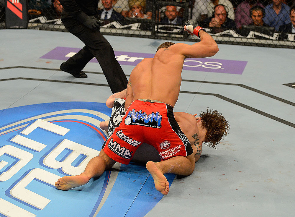 LAS VEGAS, NV - JULY 7:   Chad Mendes attempts to finish Cody McKenzie during their featherweight bout at UFC 148 inside MGM Grand Garden Arena on July 7, 2012 in Las Vegas, Nevada.  (Photo by Donald Miralle/Zuffa LLC/Zuffa LLC via Getty Images)  *** Local Caption *** Chad Mendes; Cody McKenzie