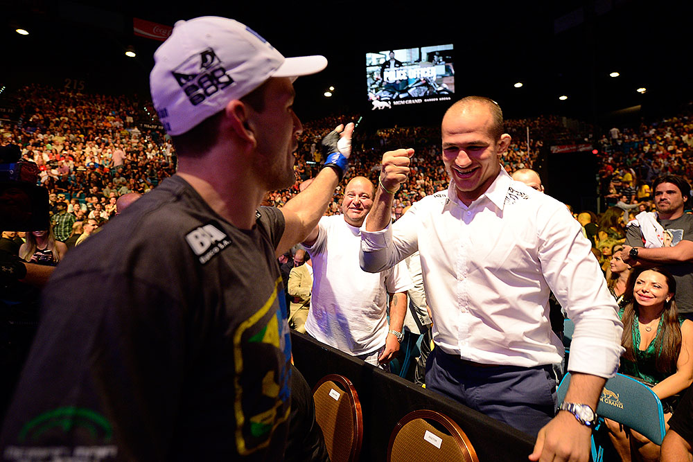 LAS VEGAS, NV - JULY 7:   (L-R) Demian Maia celebrates with Junior dos Santos after his fight with Dong Hyun Kim during UFC 148 inside MGM Grand Garden Arena on July 7, 2012 in Las Vegas, Nevada.  (Photo by Donald Miralle/Zuffa LLC/Zuffa LLC via Getty Images)  *** Local Caption *** Demian Maia