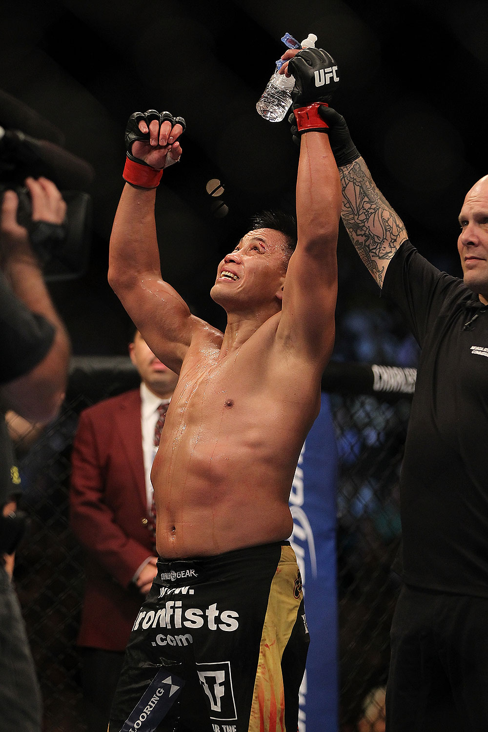 LAS VEGAS, NV - JULY 7:   Cung Le reacts to being declared the winner in his fight with Patrick Cote after their middleweight bout at UFC 148 inside MGM Grand Garden Arena on July 7, 2012 in Las Vegas, Nevada.  (Photo by Josh Hedges/Zuffa LLC/Zuffa LLC via Getty Images)  *** Local Caption *** Cung Le; Patrick Cote