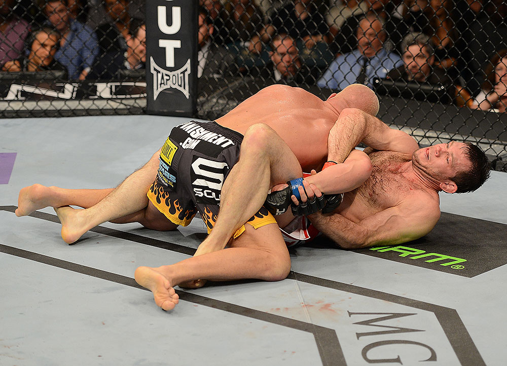LAS VEGAS, NV - JULY 7:   (R-L) Forrest Griffin attempts to submit Tito Ortiz during their light heavyweight bout at UFC 148 inside MGM Grand Garden Arena on July 7, 2012 in Las Vegas, Nevada.  (Photo by Donald Miralle/Zuffa LLC/Zuffa LLC via Getty Images)  *** Local Caption *** Tito Ortiz; Forrest Griffin