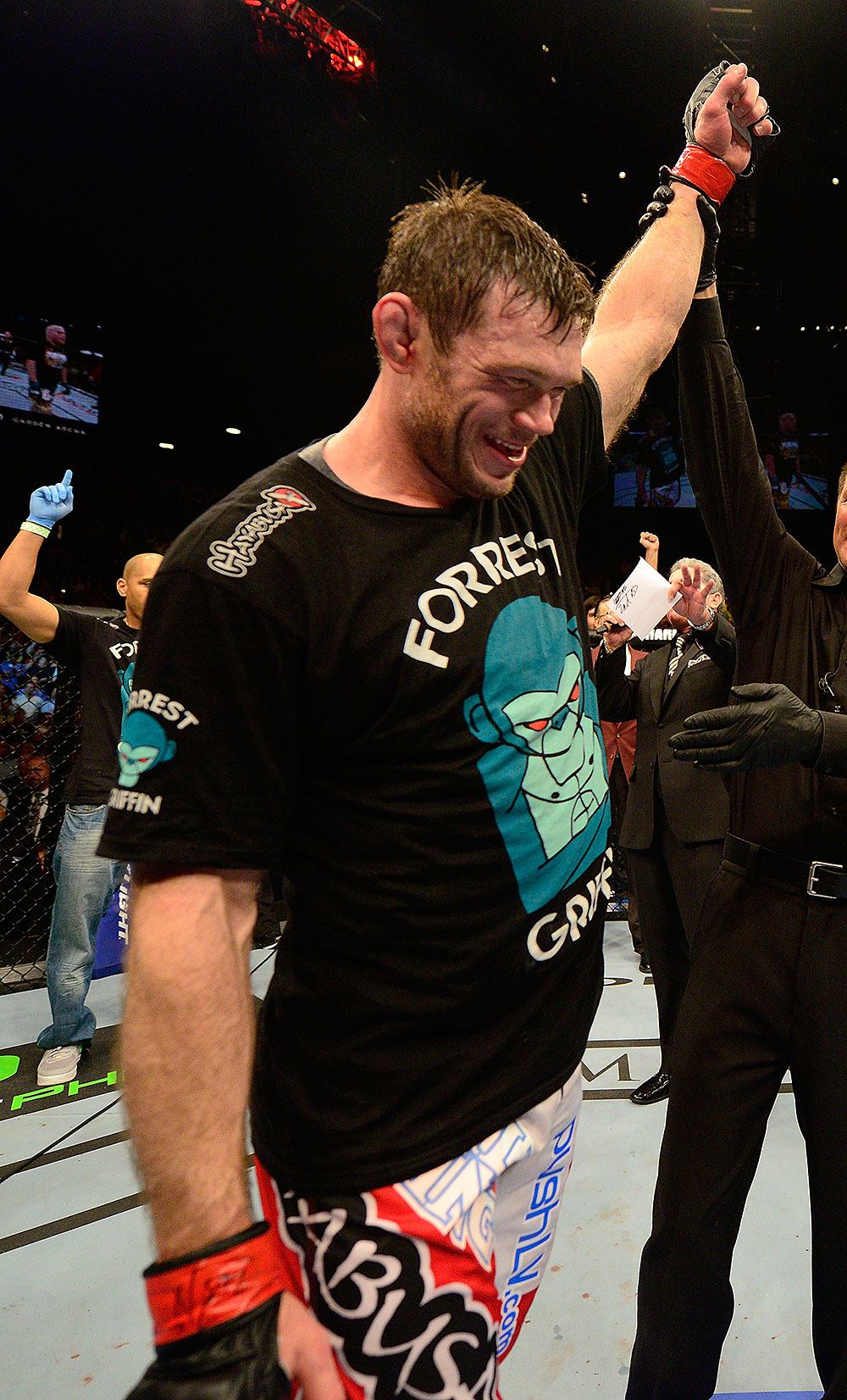 LAS VEGAS, NV - JULY 7:   Forrest Griffin reacts to being declared the winner in his fight against Tito Ortiz after their light heavyweight bout at UFC 148 inside MGM Grand Garden Arena on July 7, 2012 in Las Vegas, Nevada.  (Photo by Donald Miralle/Zuffa LLC/Zuffa LLC via Getty Images)  *** Local Caption *** Forrest Griffin
