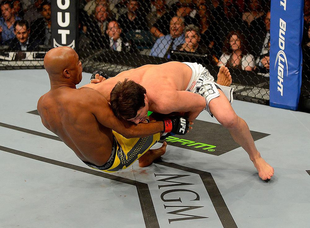 LAS VEGAS, NV - JULY 7:   (R-L) Chael Sonnen wrestles Anderson Silva during their UFC middleweight championship bout at UFC 148 inside MGM Grand Garden Arena on July 7, 2012 in Las Vegas, Nevada.  (Photo by Donald Miralle/Zuffa LLC/Zuffa LLC via Getty Images)  *** Local Caption *** Anderson Silva; Chael Sonnen
