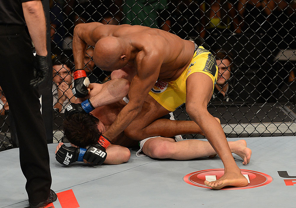 LAS VEGAS, NV - JULY 7:   (R-L) Anderson Silva punches Chael Sonnen during their UFC middleweight championship bout at UFC 148 inside MGM Grand Garden Arena on July 7, 2012 in Las Vegas, Nevada.  (Photo by Donald Miralle/Zuffa LLC/Zuffa LLC via Getty Images)  *** Local Caption *** Anderson Silva; Chael Sonnen
