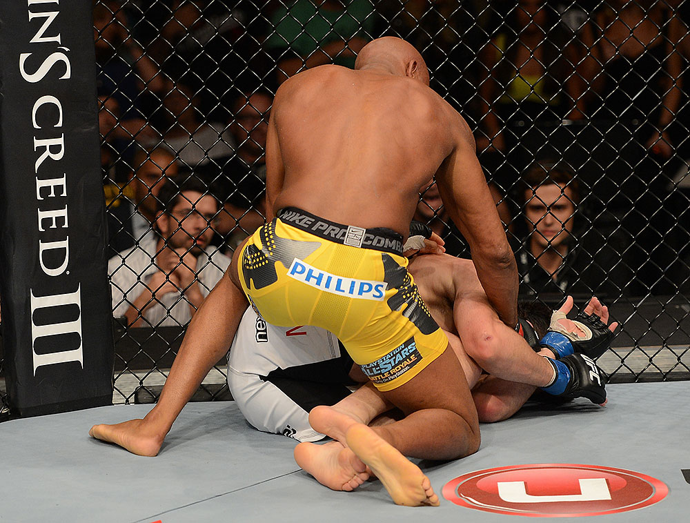 LAS VEGAS, NV - JULY 7:   (R-L) Anderson Silva punches Chael Sonnen during their UFC middleweight championship bout at UFC 148 inside MGM Grand Garden Arena on July 7, 2012 in Las Vegas, Nevada.  (Photo by Donald Miralle/Zuffa LLC/Zuffa LLC via Getty Images)  *** Local Caption *** Anderson Silva; Chael Sonnen
