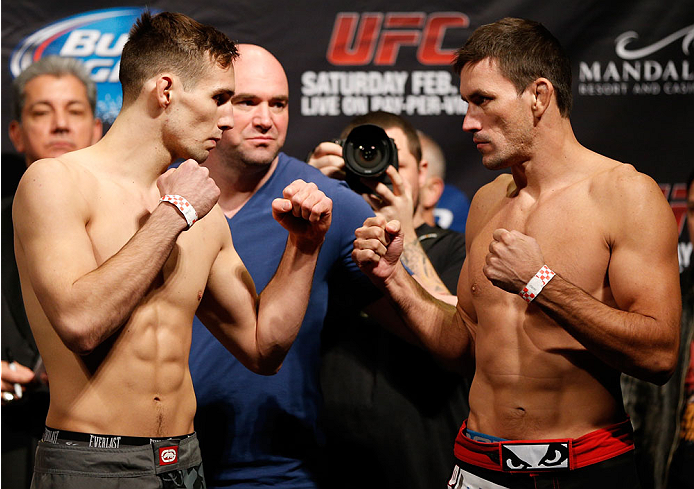 LAS VEGAS, NV - FEBRUARY 21:  (L-R) Opponents Rory MacDonald and Demian Maia face off during the UFC 170 weigh-in event at the Mandalay Bay Events Center on February 21, 2014 in Las Vegas, Nevada. (Photo by Josh Hedges/Zuffa LLC/Zuffa LLC via Getty Images)