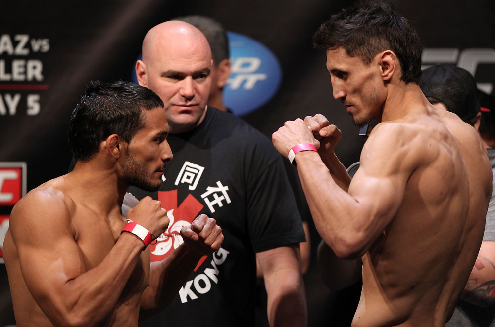 EAST RUTHERFORD, NJ - MAY 04: (L-R) Featherweight opponents Dennis Bermudez and Pablo Garza face off after weighing in during the UFC on FOX official weigh in at Izod Center on May 4, 2012 in East Rutherford, New Jersey. (Photo by Josh Hedges/Zuffa LLC/Zuffa LLC via Getty Images)