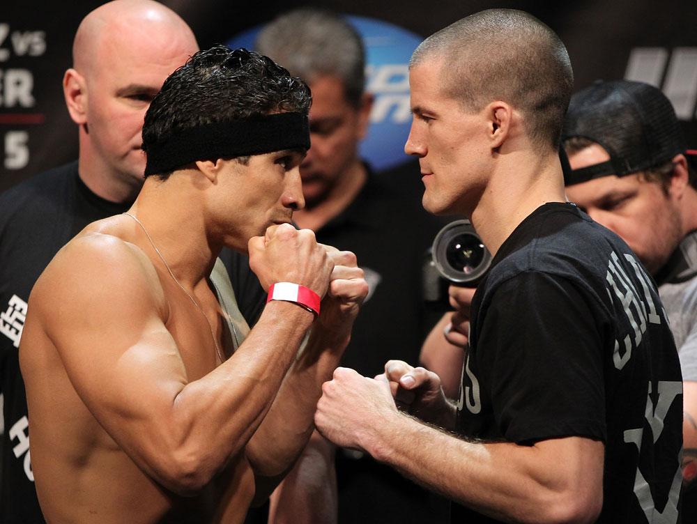 EAST RUTHERFORD, NJ - MAY 04: (L-R) Lightweight opponents Danny Castillo and John Cholish face off after weighing in during the UFC on FOX official weigh in at Izod Center on May 4, 2012 in East Rutherford, New Jersey. (Photo by Josh Hedges/Zuffa LLC/Zuffa LLC via Getty Images)