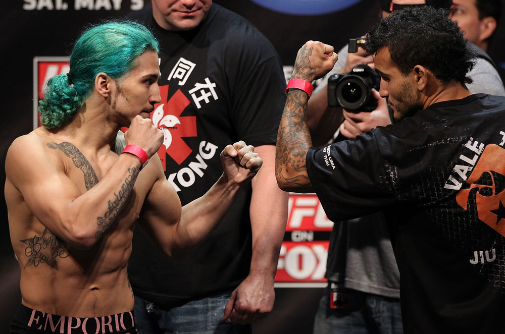 EAST RUTHERFORD, NJ - MAY 04: (L-R) Flyweight opponents Louis Gaudinot and John Lineker face off during the UFC on FOX official weigh in at Izod Center on May 4, 2012 in East Rutherford, New Jersey. (Photo by Josh Hedges/Zuffa LLC/Zuffa LLC via Getty Images)