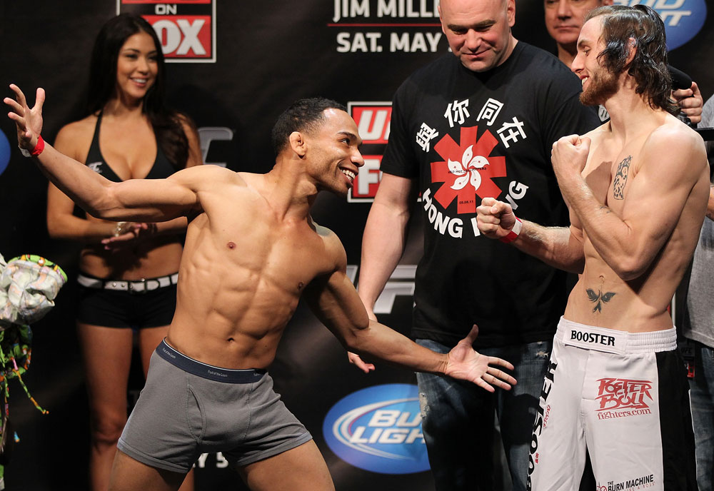 EAST RUTHERFORD, NJ - MAY 04: (L-R) Flyweight opponents John Dodson and Timothy Elliot face off after weighing in during the UFC on FOX official weigh in at Izod Center on May 4, 2012 in East Rutherford, New Jersey. (Photo by Josh Hedges/Zuffa LLC/Zuffa LLC via Getty Images)