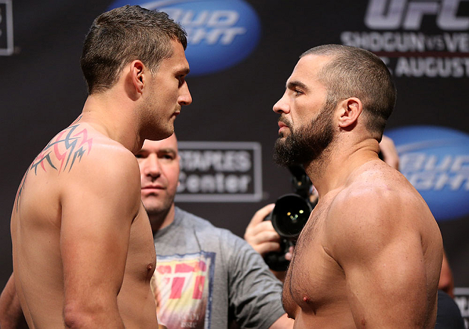 LOS ANGELES - AUGUST 03: (L-R) Phil De Fries and Oli Thompson face off during the UFC on FOX weigh in at Staples Center on August 3, 2012 in Los Angeles, California. (Photo by Josh Hedges/Zuffa LLC/Zuffa LLC via Getty Images)