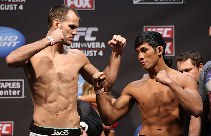 LOS ANGELES - AUGUST 03: (L-R) Opponents Cole Miller and Nam Phan face off during the UFC on FOX weigh in at Staples Center on August 3, 2012 in Los Angeles, California. (Photo by Josh Hedges/Zuffa LLC/Zuffa LLC via Getty Images)