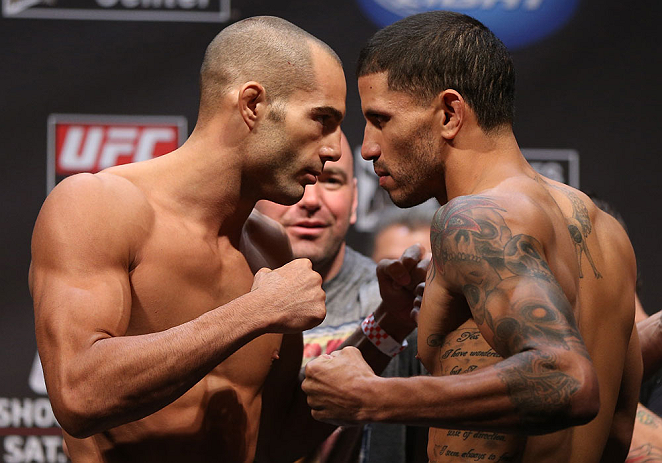 LOS ANGELES - AUGUST 03: (L-R) Opponents Mike Swick and DaMarques Johnson face off during the UFC on FOX weigh in at Staples Center on August 3, 2012 in Los Angeles, California. (Photo by Josh Hedges/Zuffa LLC/Zuffa LLC via Getty Images)