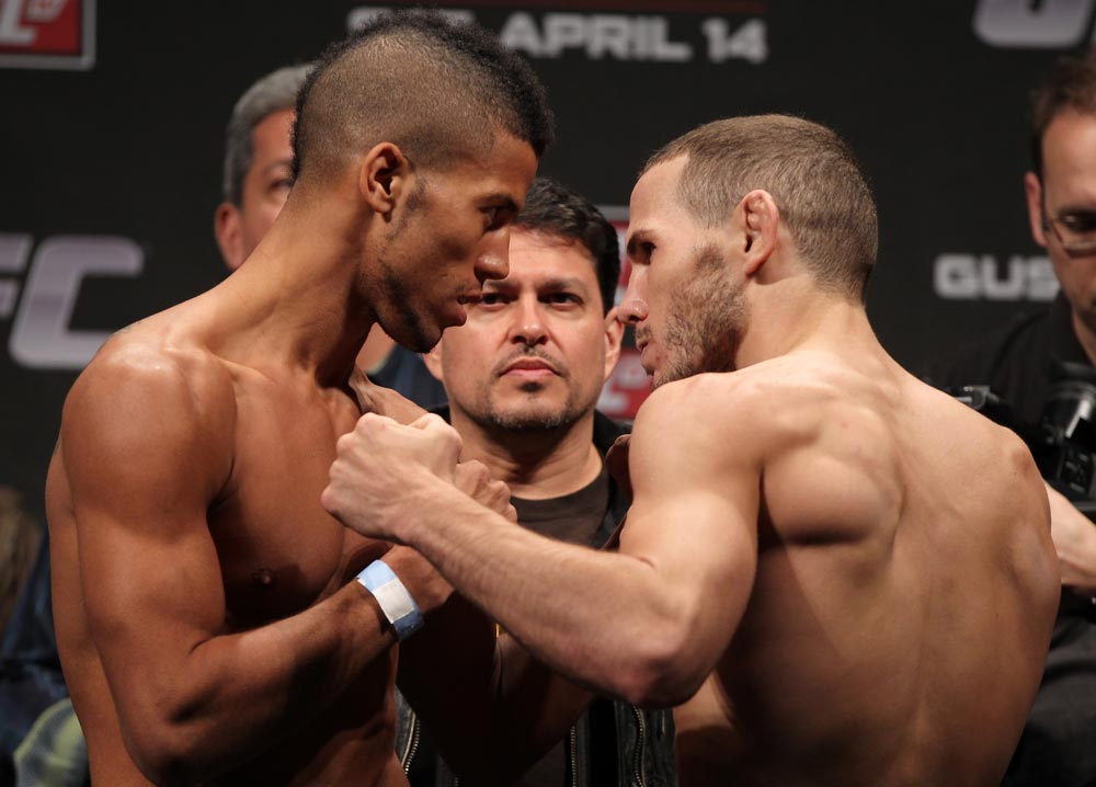 STOCKHOLM, SWEDEN - APRIL 13: (L-R) Featherweight opponents Jason Young and Eric Wisely face off after weighing in during the official UFC on Fuel TV weigh in event at Ericsson Globe on April 13, 2012 in Stockholm, Sweden. (Photo by Josh Hedges/Zuffa LLC/Zuffa LLC via Getty Images)
