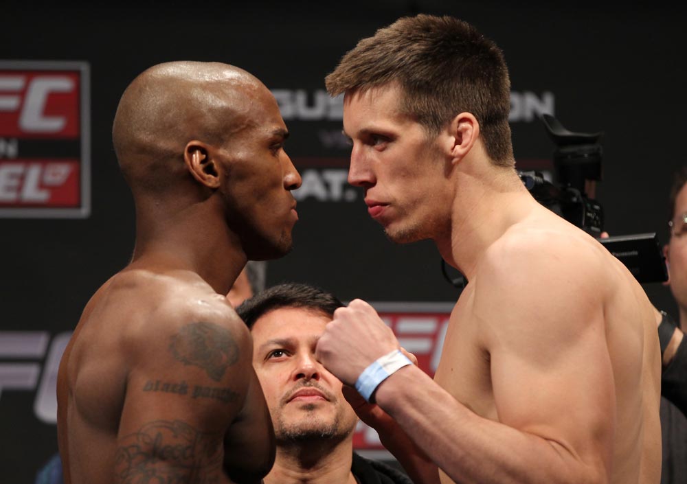 STOCKHOLM, SWEDEN - APRIL 13: (L-R) Middleweight opponents Francis Carmont and Magnus Cedenblad face off after weighing in during the official UFC on Fuel TV weigh in event at Ericsson Globe on April 13, 2012 in Stockholm, Sweden. (Photo by Josh Hedges/Zuffa LLC/Zuffa LLC via Getty Images)